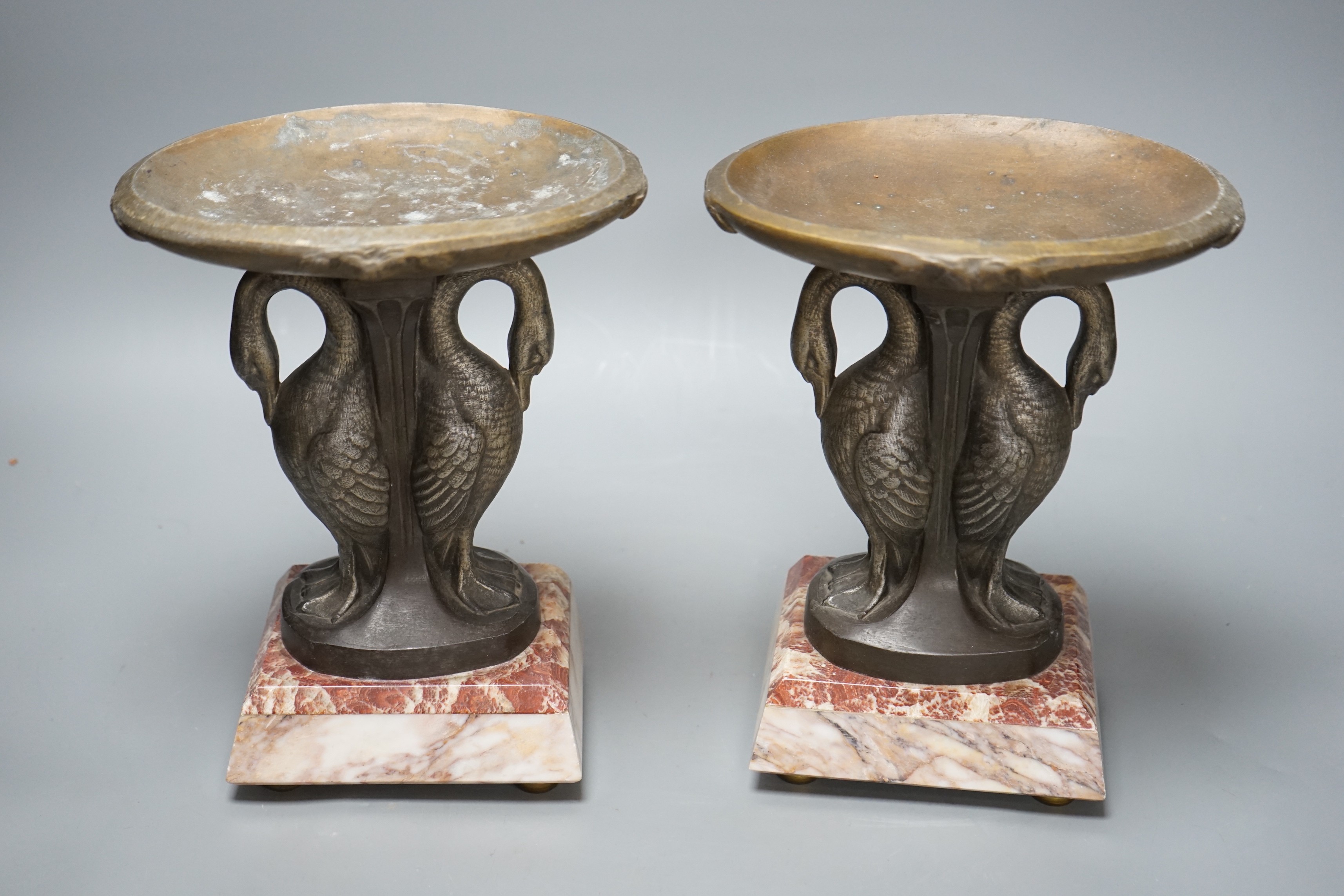 A pair of Art Deco spelter and marble ‘swan’ garnitures, 24cm